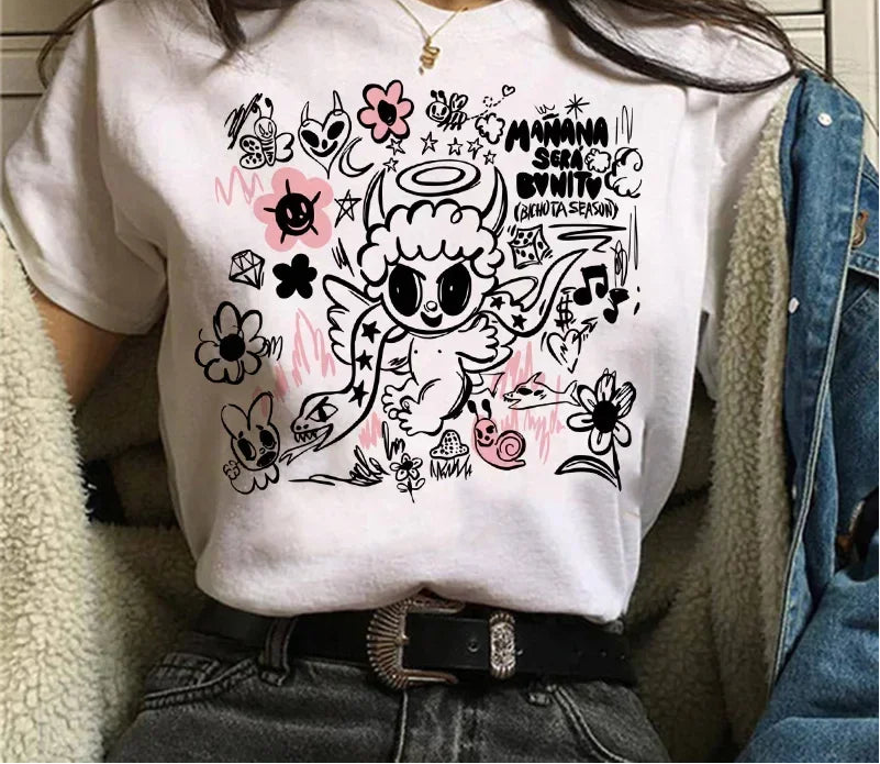 Person wearing a white t-shirt with cartoon character and text design.